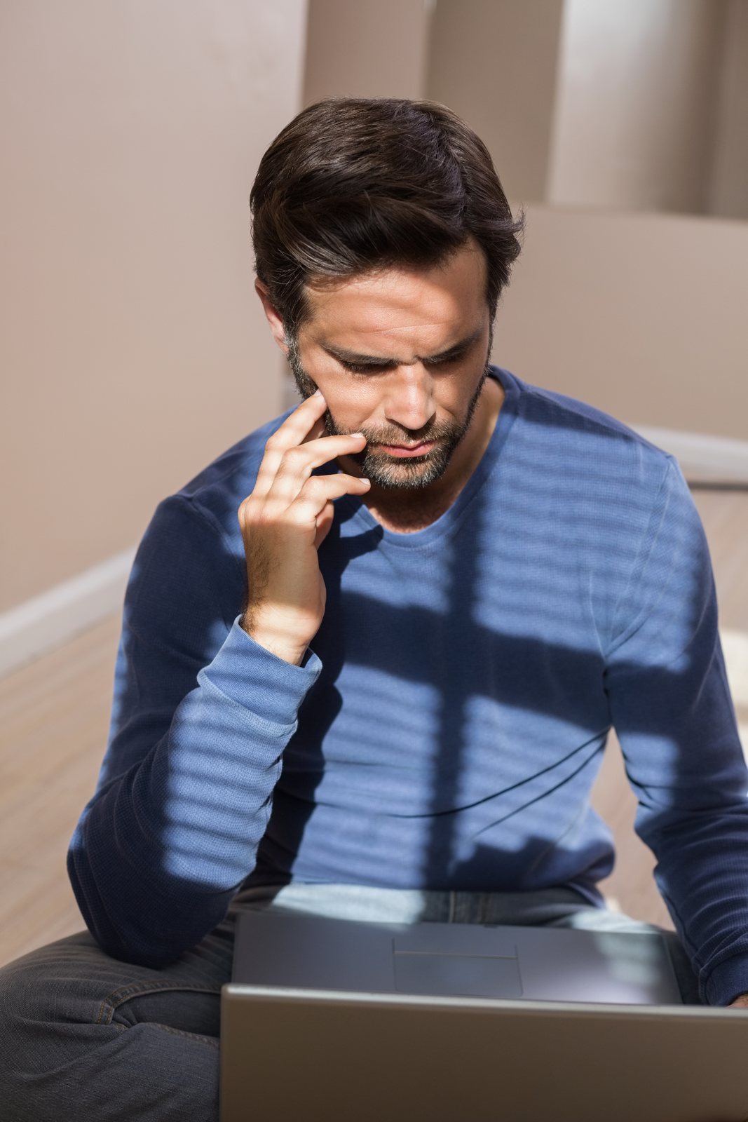 Man checking his credit score on his phone